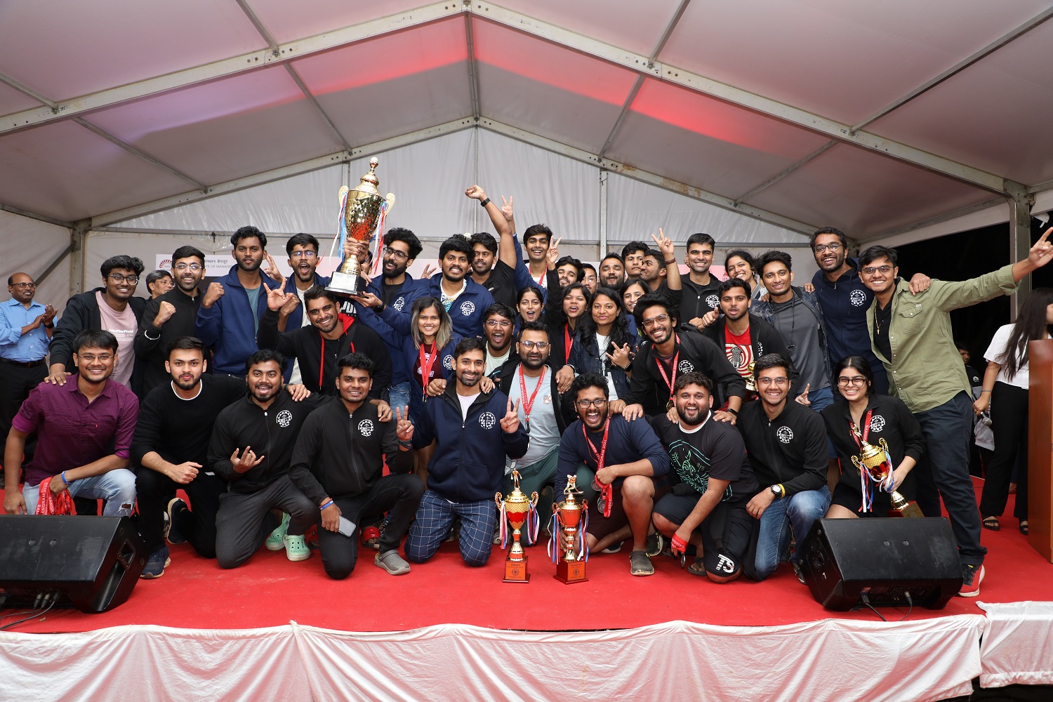 IIM Kozhikode participants with the runners-up trophy of Sangram 2022.  