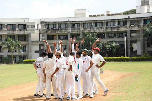 The Bangalore team celebrates its victory in the friendly match.