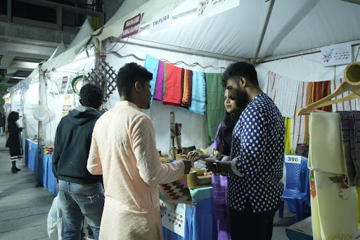 Fellows setting up their stalls