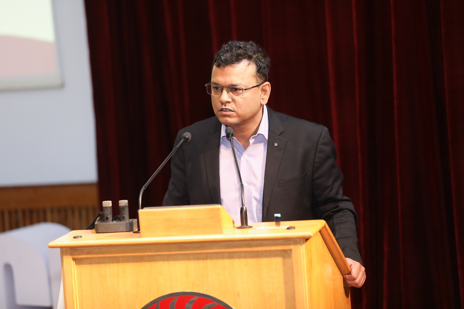 Himanshu Nivsarkar, Executive Vice President & Head, CSR, addresses the participants.