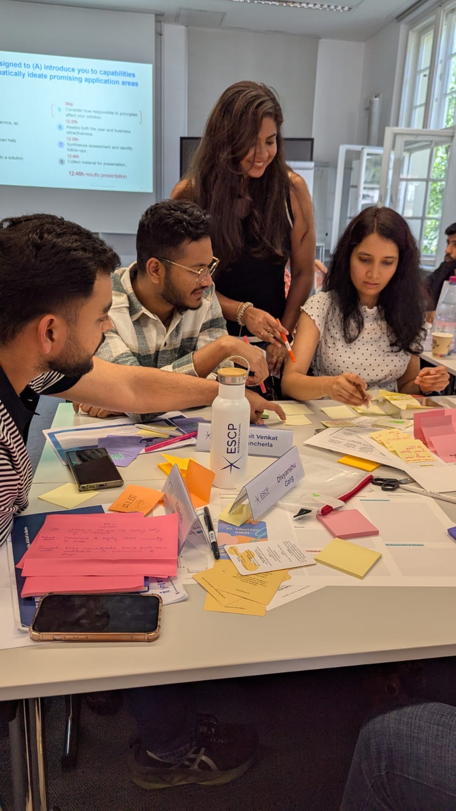 In an interactive workshop, students use innovation cards to explore how AI could transform different modes of transportation.